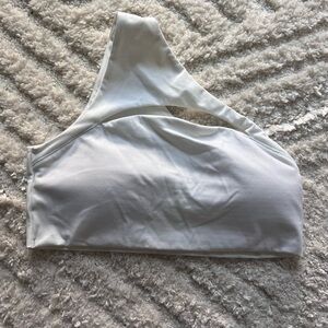 White Alphalete one shoulder sports bra